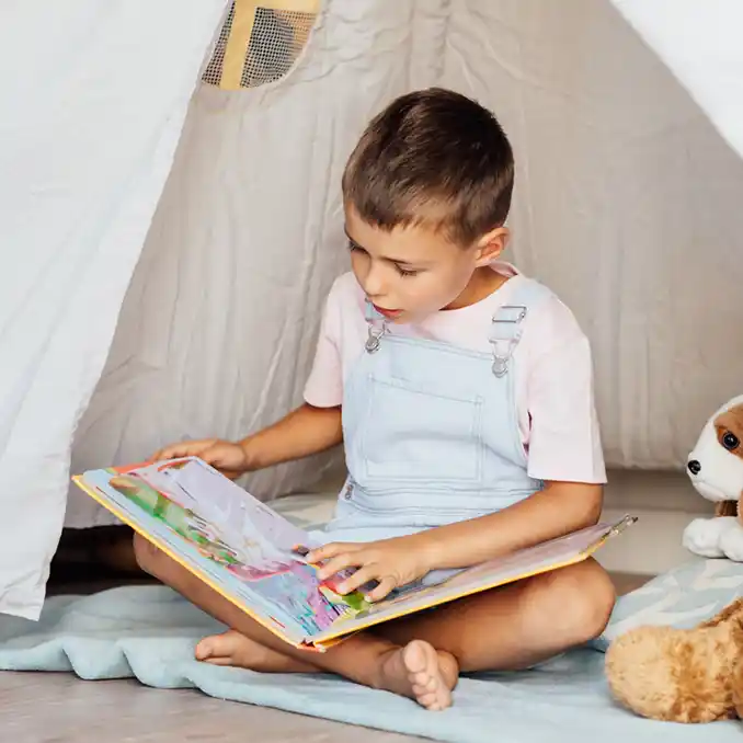 Child reading a book