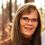 Cherrie, a family home daycare provider in Michigan, sharing her Care Courses testimonial about flexible book-based learning at her own pace for over 10 years.